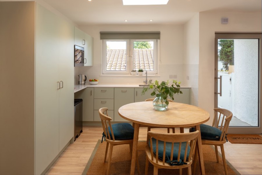 Image of the welcome kitchen with view through window